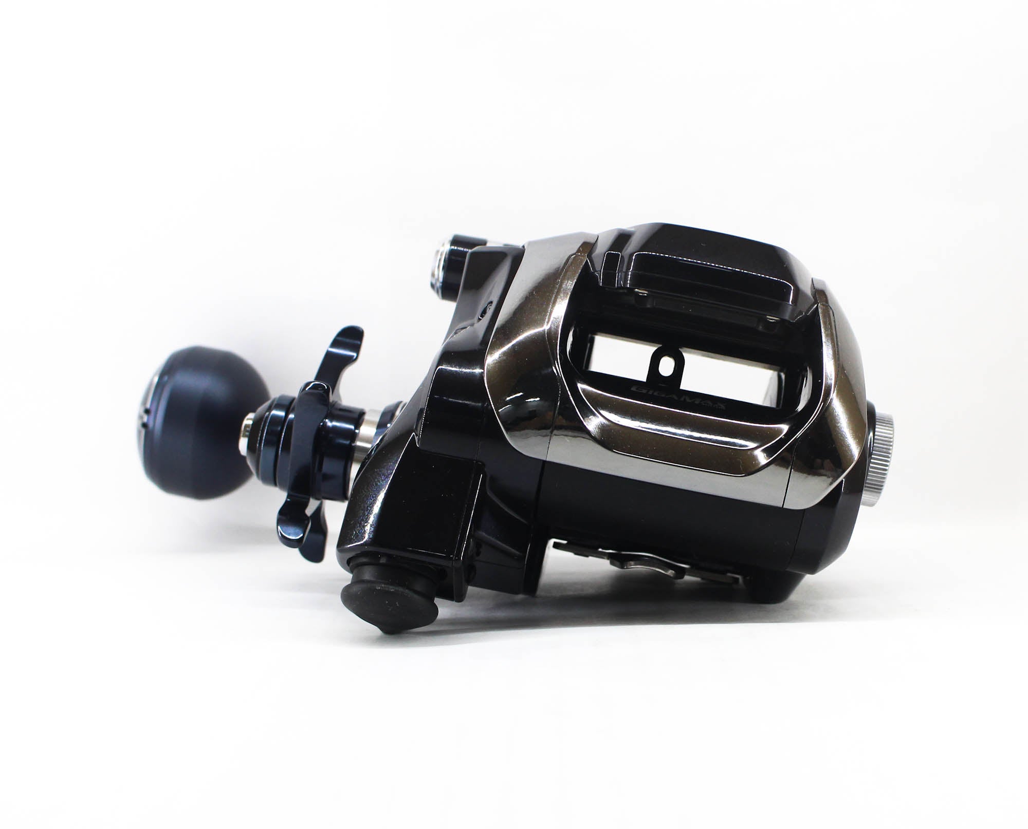 Fishing reel with metallic finish on a white background