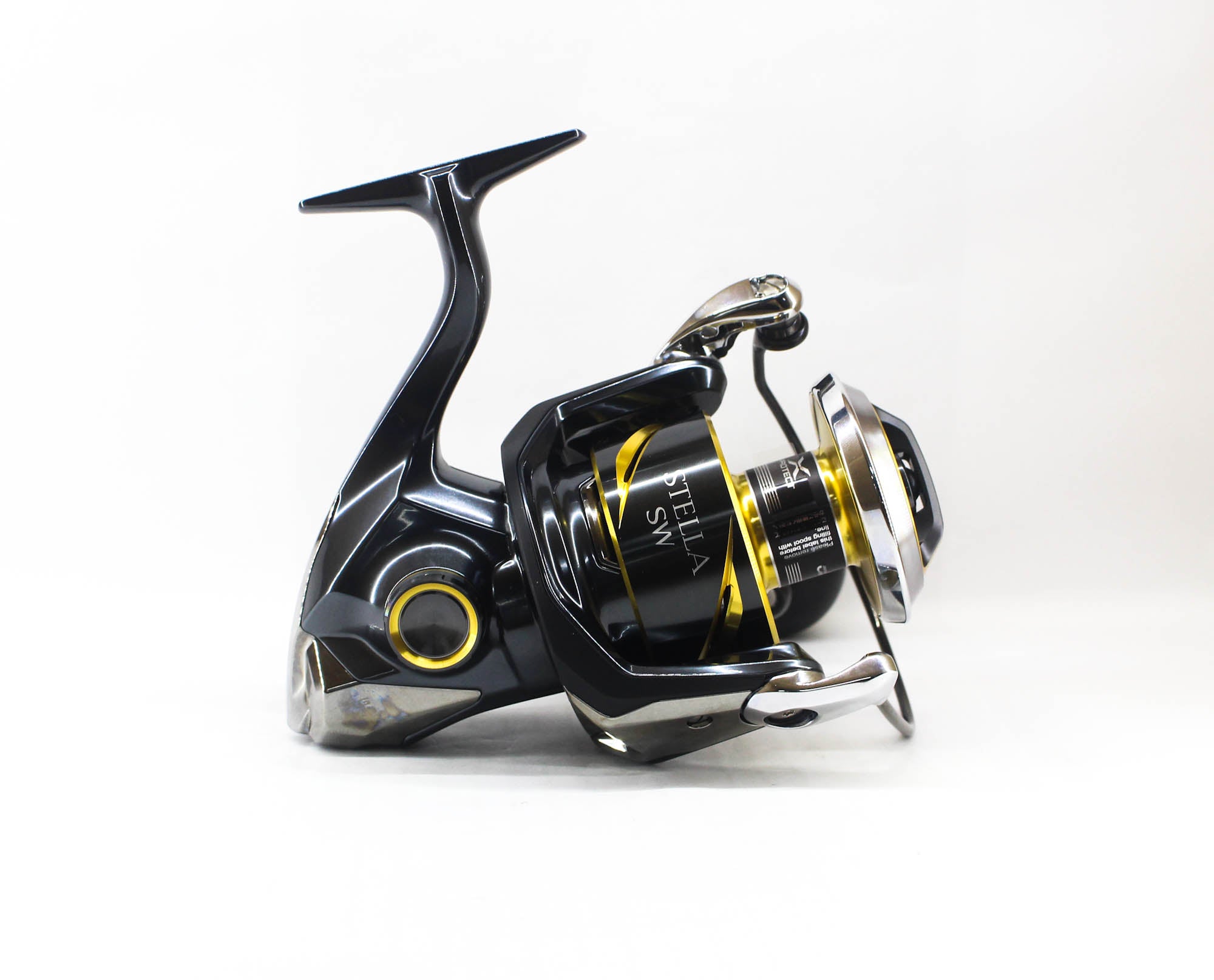 Fishing reel with black and yellow design on a white background