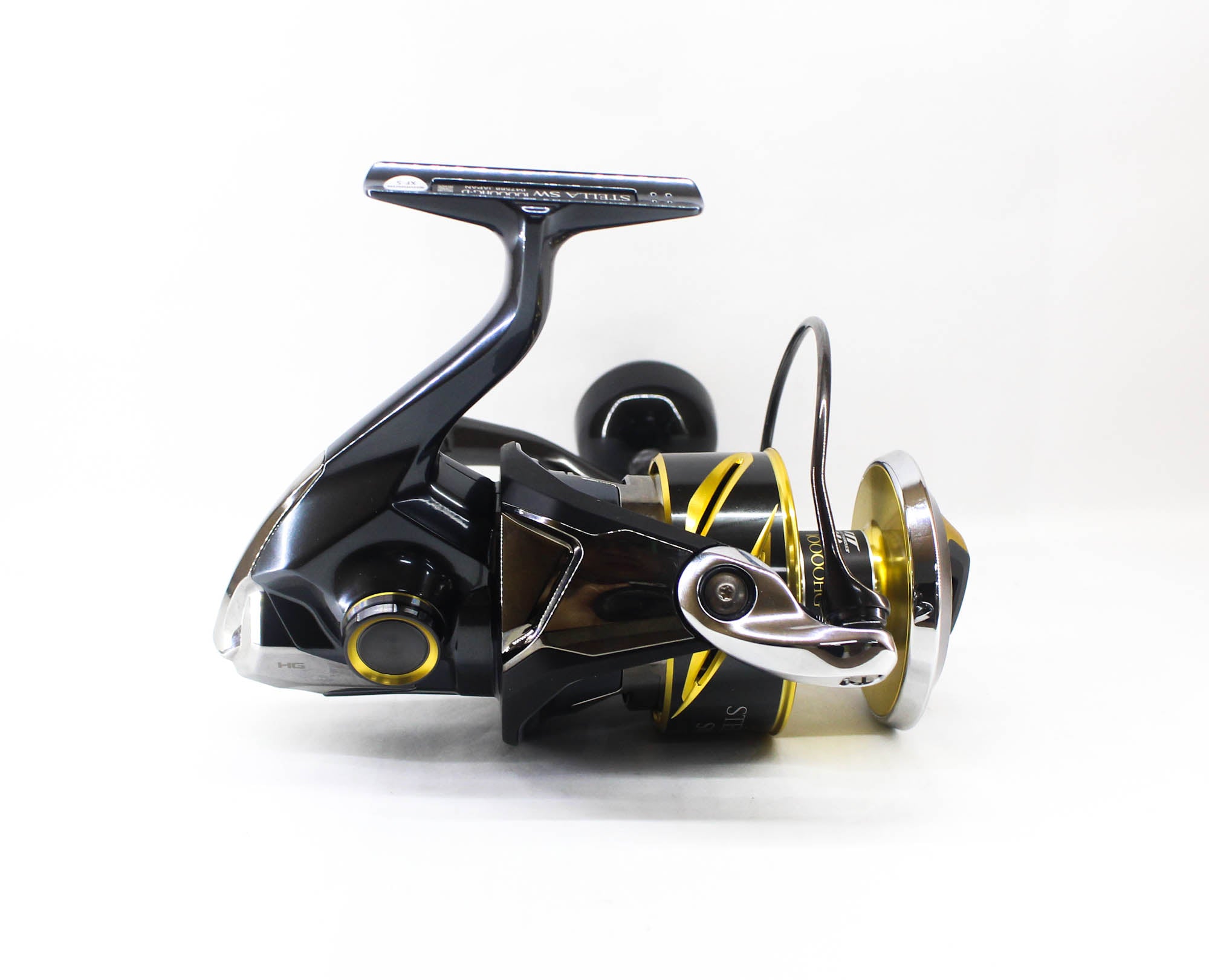 Fishing reel with black and yellow design on a white background