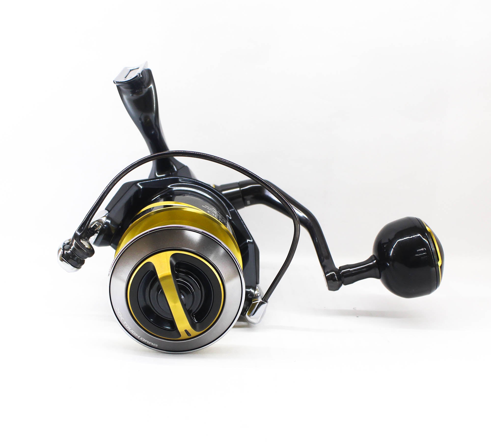 Fishing reel with black and yellow design on a white background