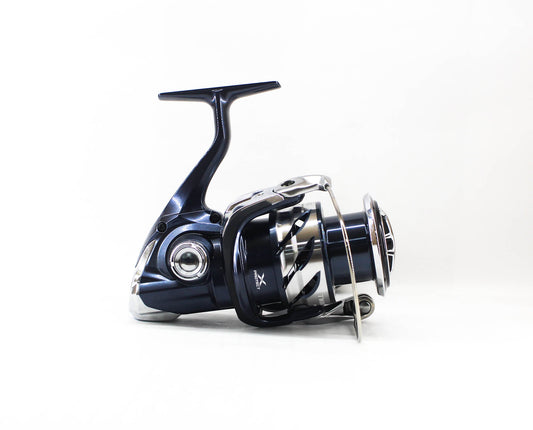 Fishing reel on a white background