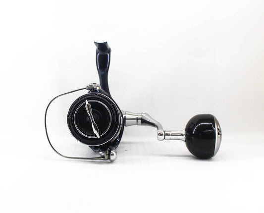 Fishing reel with black and silver design on a white background
